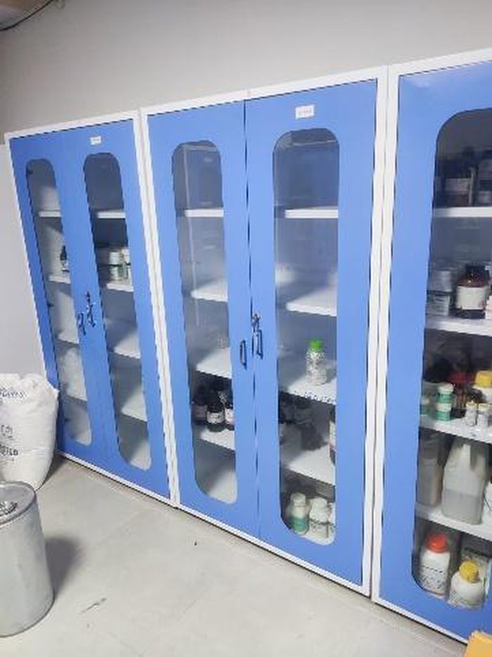 Chemical storage cabinets with glass doors