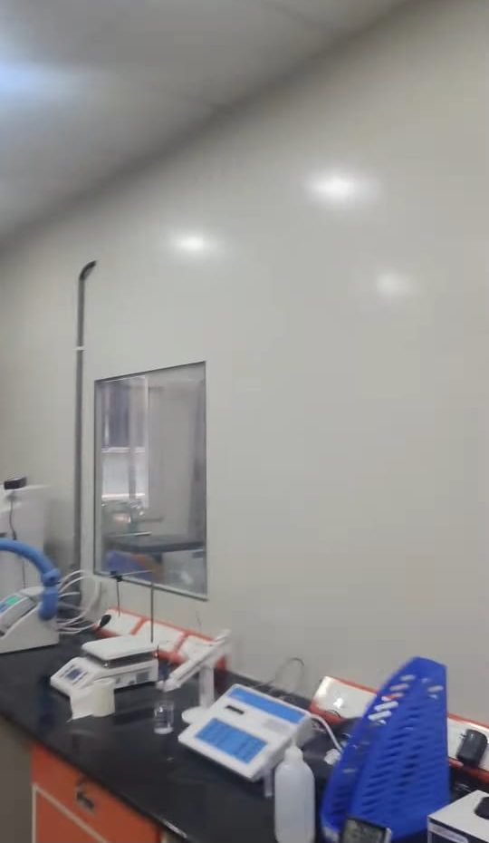Cleanroom laboratory bench with instruments and fume enclosure