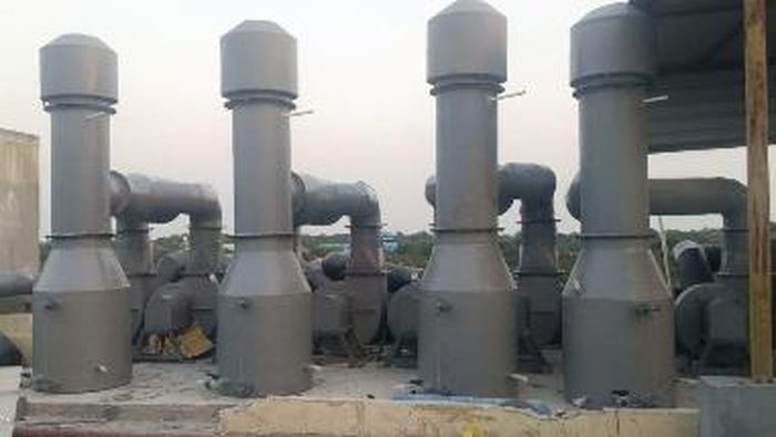 Exhaust scrubber stacks on rooftop