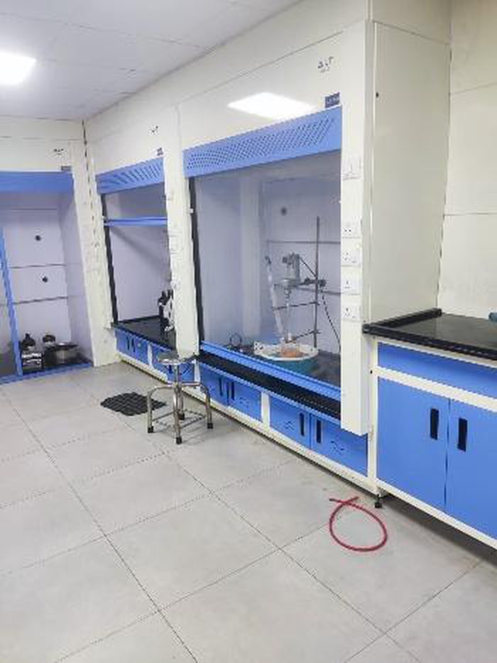 Low base fume hood for tall apparatus