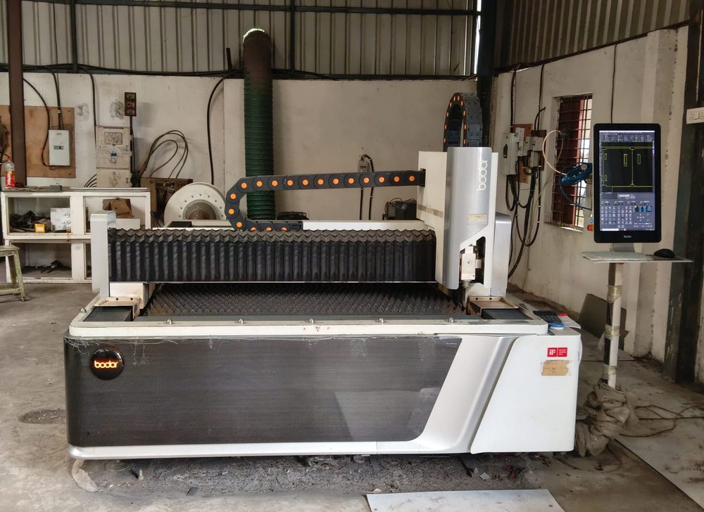 CNC fiber laser cutting machine at Syntic Products manufacturing facility